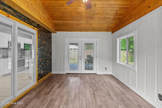 1428 Forest Hill Dr, Leland, NC 28451 - unfurnished sunroom with vaulted ceiling and french doors