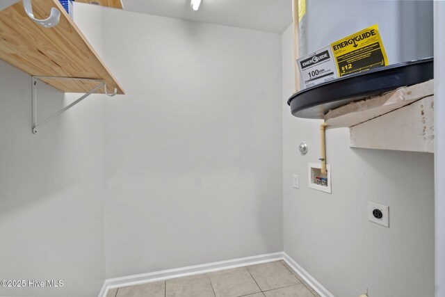 1428 Forest Hill Dr, Leland, NC 28451 - washroom with washer hookup, baseboards, electric dryer hookup, water heater, and tile patterned flooring