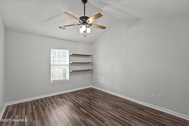 1428 Forest Hill Dr, Leland, NC 28451 - unfurnished room featuring dark wood finished floors, lofted ceiling, baseboards, and ceiling fan
