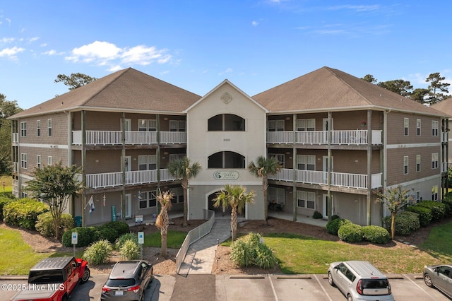 300 Lighthouse Ln Unit C2, Cedar Point, NC 28584 - view of property with uncovered parking
