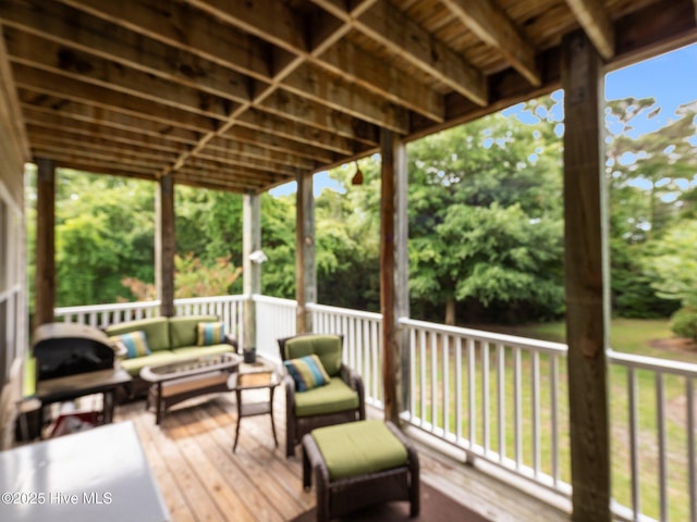 300 Lighthouse Ln Unit C2, Cedar Point, NC 28584 - wooden deck with an outdoor living space and view of scattered trees