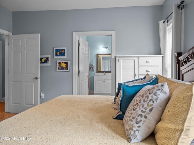 300 Lighthouse Ln Unit C2, Cedar Point, NC 28584 - bedroom with wood finished floors and a sink