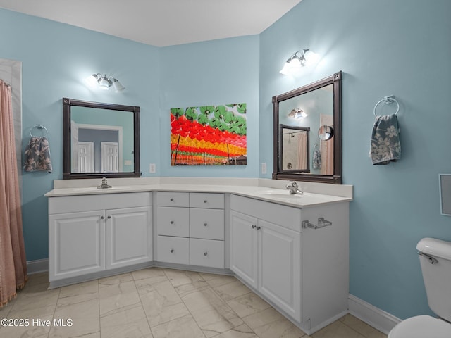 300 Lighthouse Ln Unit C2, Cedar Point, NC 28584 - full bath with double vanity, marble finish flooring, toilet, and baseboards
