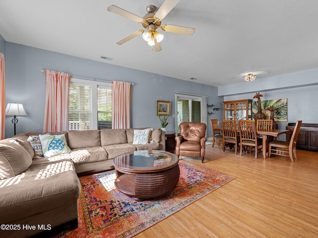 300 Lighthouse Ln Unit C2, Cedar Point, NC 28584 - living area with wood finished floors and ceiling fan