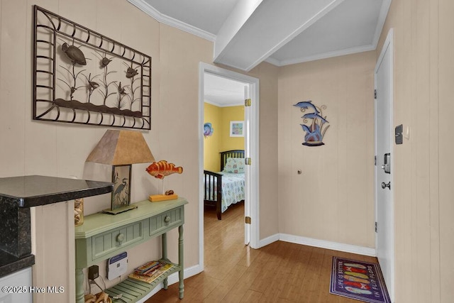 101 W First St # A2, Ocean Isle Beach, NC 28469 - corridor with wood finished floors, crown molding, and baseboards