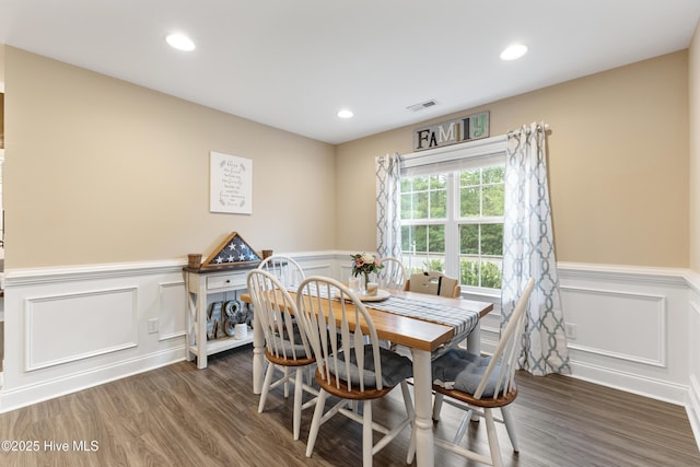 849 Rolling Pines Loop Rd, Leland, NC 28451 - dining space featuring a wainscoted wall, a decorative wall, wood finished floors, and recessed lighting