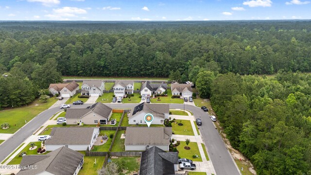 849 Rolling Pines Loop Rd, Leland, NC 28451 - aerial view of residential area with a heavily wooded area