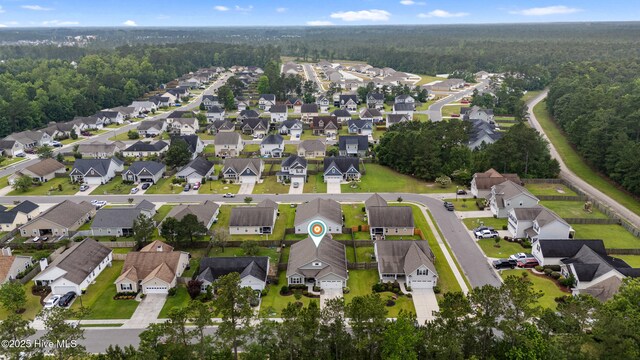 849 Rolling Pines Loop Rd, Leland, NC 28451 - view of property location with a heavily wooded area and nearby suburban area