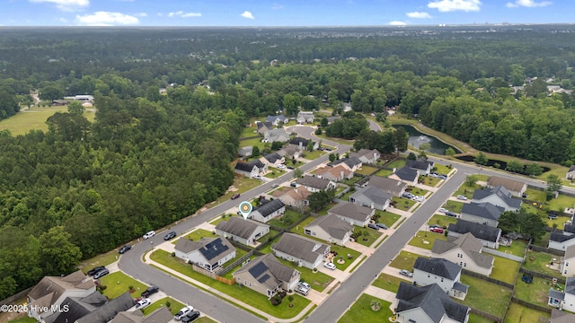 849 Rolling Pines Loop Rd, Leland, NC 28451 - aerial view of property and surrounding area with a forest and nearby suburban area