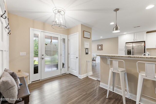 849 Rolling Pines Loop Rd, Leland, NC 28451 - entryway with dark wood-type flooring, recessed lighting, baseboards, and a chandelier