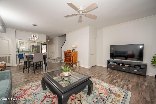 103 Continental Dr Unit 3, Elizabeth City, NC 27909 - living area featuring wood finished floors, ornamental molding, a ceiling fan, baseboards, and stairway
