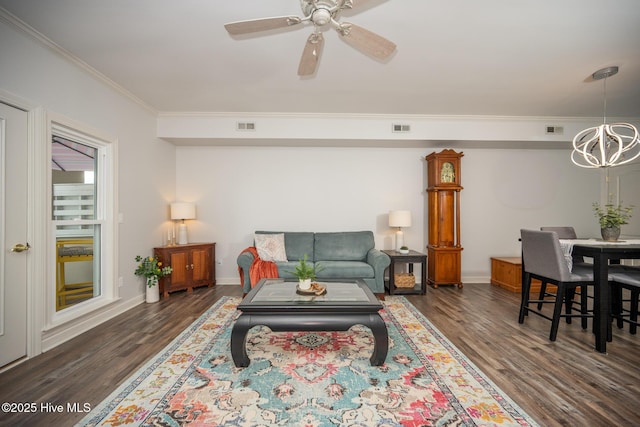 103 Continental Dr Unit 3, Elizabeth City, NC 27909 - living area with wood finished floors, a chandelier, crown molding, baseboards, and ceiling fan