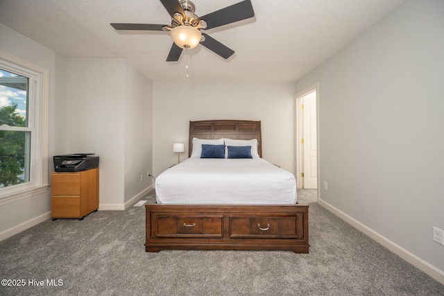 103 Continental Dr Unit 3, Elizabeth City, NC 27909 - bedroom featuring multiple windows, carpet, baseboards, and ceiling fan
