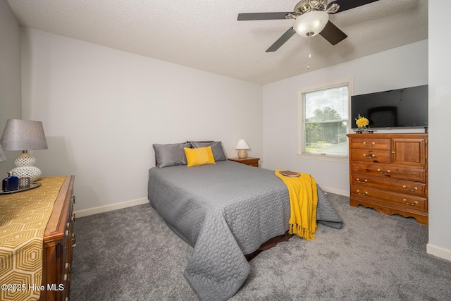103 Continental Dr Unit 3, Elizabeth City, NC 27909 - carpeted bedroom featuring baseboards and a ceiling fan