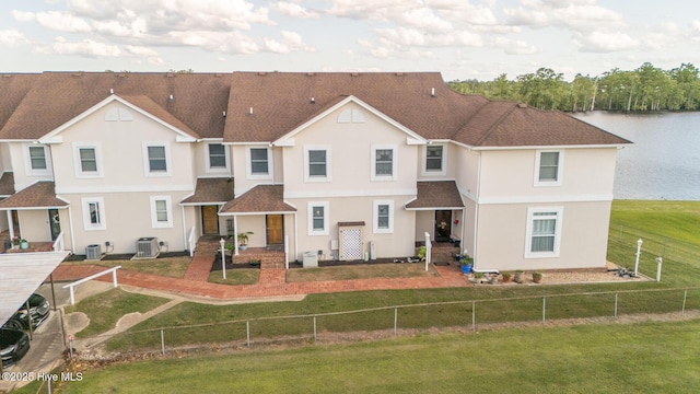 103 Continental Dr Unit 3, Elizabeth City, NC 27909 - back of property featuring stucco siding, central AC unit, and a shingled roof