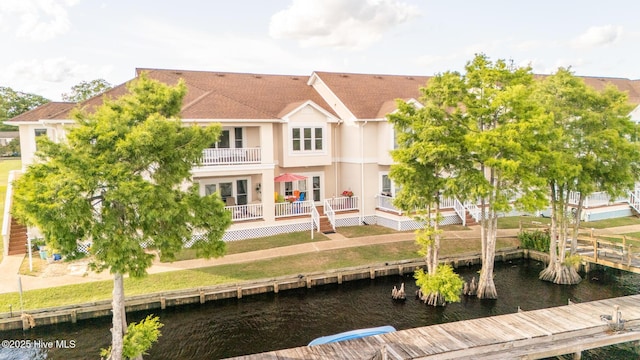103 Continental Dr Unit 3, Elizabeth City, NC 27909 - back of property with a water view, a balcony, and stucco siding