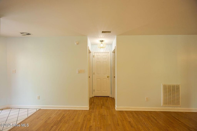 421 Commerce Ave Unit B, Morehead City, NC 28557 - empty room with baseboards and wood finished floors