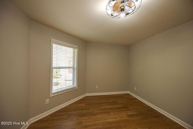 421 Commerce Ave Unit B, Morehead City, NC 28557 - unfurnished room with dark wood-style floors and baseboards