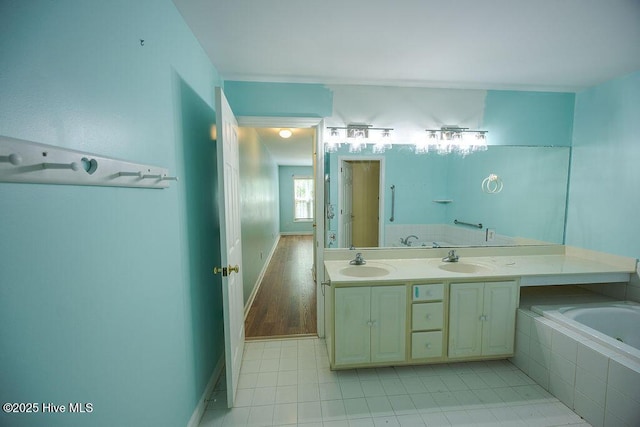 421 Commerce Ave Unit B, Morehead City, NC 28557 - full bath featuring a bath, double vanity, and tile patterned flooring