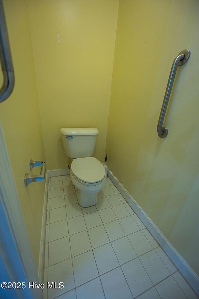 421 Commerce Ave Unit B, Morehead City, NC 28557 - bathroom featuring tile patterned flooring, toilet, and baseboards