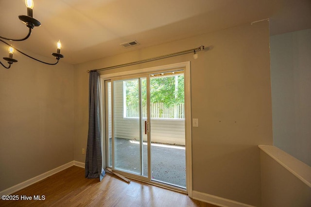 421 Commerce Ave Unit B, Morehead City, NC 28557 - entryway featuring wood finished floors and baseboards
