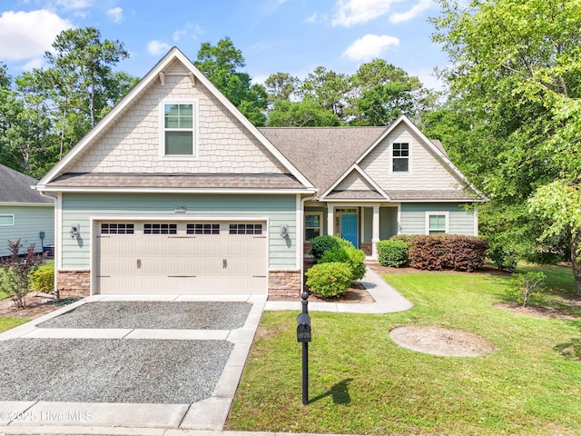1678 Old Salt SW, Shallotte, NC 28470 - craftsman-style home featuring stone siding, driveway, a front yard, and a shingled roof