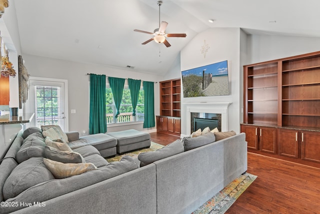 1678 Old Salt SW, Shallotte, NC 28470 - living room with ceiling fan, a high end fireplace, dark wood-style flooring, and high vaulted ceiling