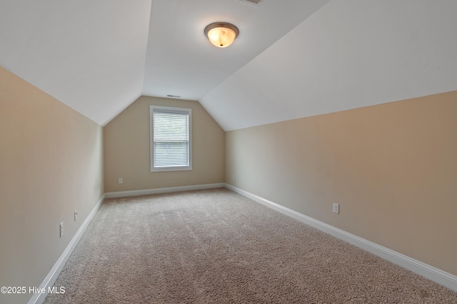 1678 Old Salt SW, Shallotte, NC 28470 - bonus room featuring light colored carpet, lofted ceiling, and baseboards