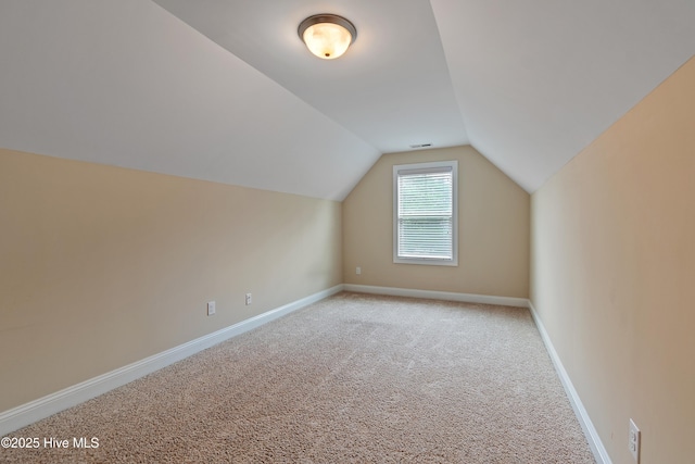 1678 Old Salt SW, Shallotte, NC 28470 - additional living space featuring light colored carpet, vaulted ceiling, and baseboards