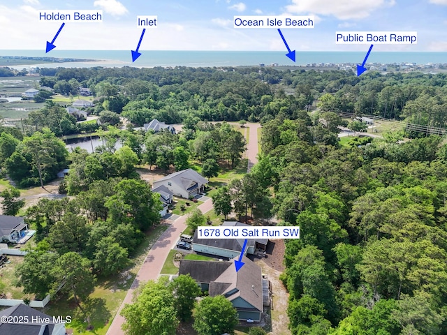 1678 Old Salt SW, Shallotte, NC 28470 - aerial view of residential area featuring a forest and a nearby body of water
