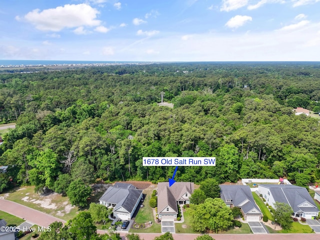 1678 Old Salt SW, Shallotte, NC 28470 - aerial perspective of suburban area with a forest