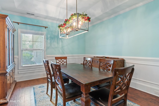 1678 Old Salt SW, Shallotte, NC 28470 - dining space featuring a chandelier, wood finished floors, crown molding, and a wainscoted wall