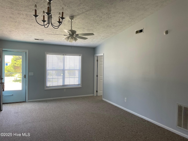 713 Varsity Dr, Wilmington, NC 28403 - unfurnished room featuring plenty of natural light, ceiling fan, baseboards, carpet flooring, and a textured ceiling