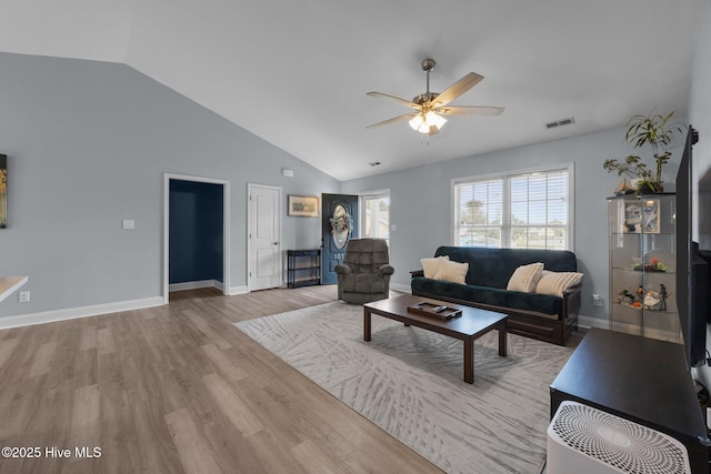 1014 Ponderosa Pl, Jacksonville, NC 28546 - living area with vaulted ceiling, ceiling fan, wood finished floors, and baseboards