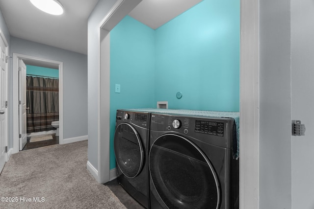 1014 Ponderosa Pl, Jacksonville, NC 28546 - laundry area with washer and clothes dryer, carpet floors, and baseboards