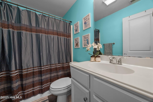 1014 Ponderosa Pl, Jacksonville, NC 28546 - bathroom with toilet, vanity, and a shower with shower curtain