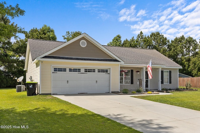1014 Ponderosa Pl, Jacksonville, NC 28546 - single story home featuring an attached garage, concrete driveway, a shingled roof, and central AC