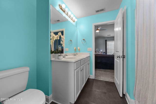 1014 Ponderosa Pl, Jacksonville, NC 28546 - full bath featuring double vanity, toilet, and ceiling fan