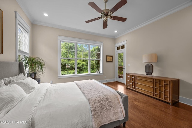 137 Summerset Lndg, Hampstead, NC 28443 - bedroom with ornamental molding, multiple windows, dark wood-type flooring, access to outside, and recessed lighting