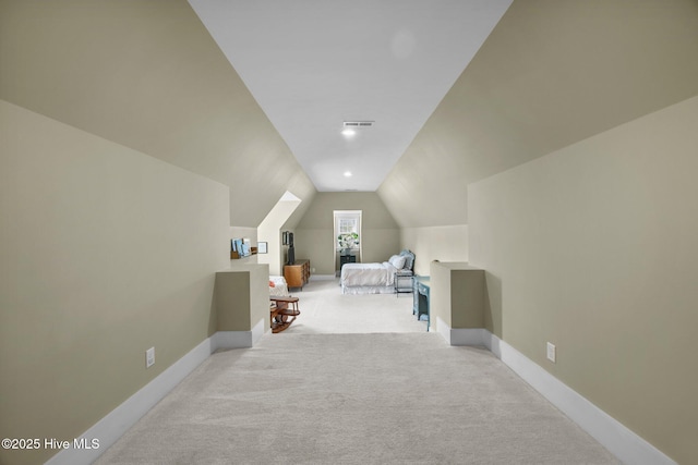 137 Summerset Lndg, Hampstead, NC 28443 - bedroom with vaulted ceiling and light colored carpet