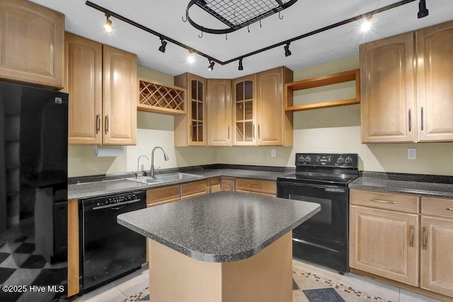 408 N 25th St, Wilmington, NC 28405 - kitchen with black appliances, a sink, track lighting, open shelves, and a center island