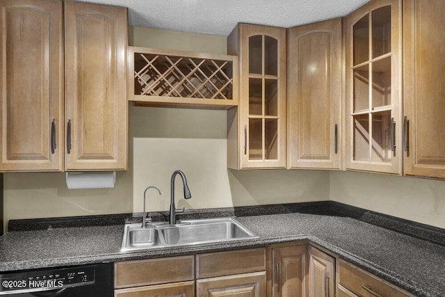 408 N 25th St, Wilmington, NC 28405 - kitchen featuring dishwasher, a sink, dark countertops, and glass insert cabinets