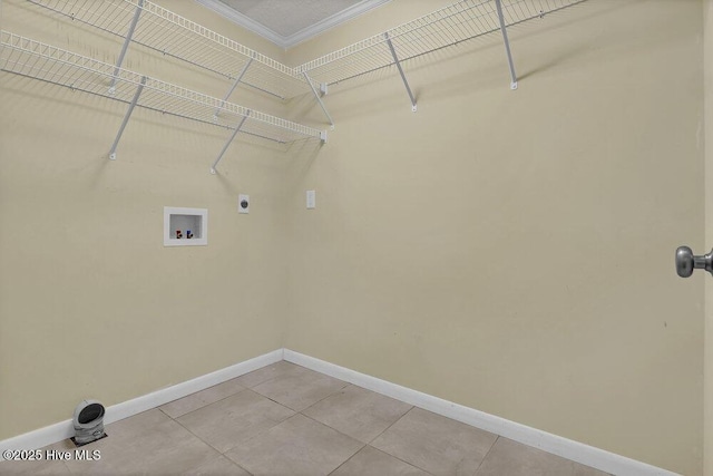 408 N 25th St, Wilmington, NC 28405 - washroom with ornamental molding, baseboards, hookup for a washing machine, electric dryer hookup, and light tile patterned floors