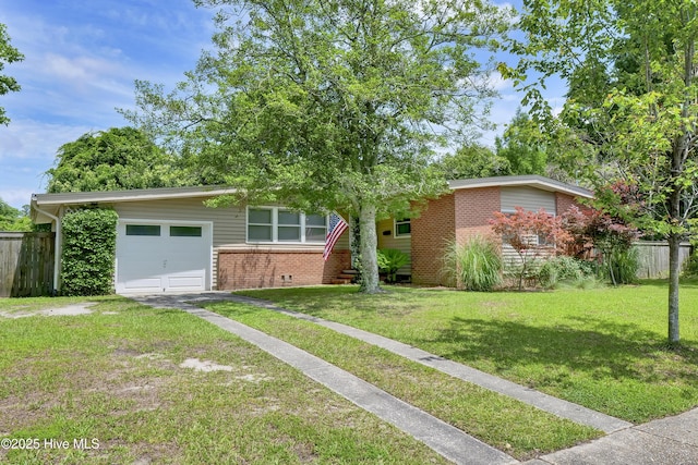 408 N 25th St, Wilmington, NC 28405 - view of front of home featuring brick siding, driveway, and a garage