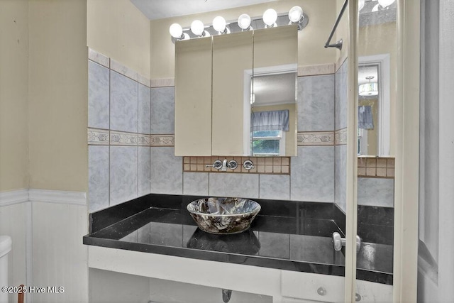 408 N 25th St, Wilmington, NC 28405 - bathroom featuring a wainscoted wall, backsplash, and toilet