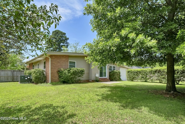 408 N 25th St, Wilmington, NC 28405 - view of front of house featuring entry steps, a garage, and brick siding