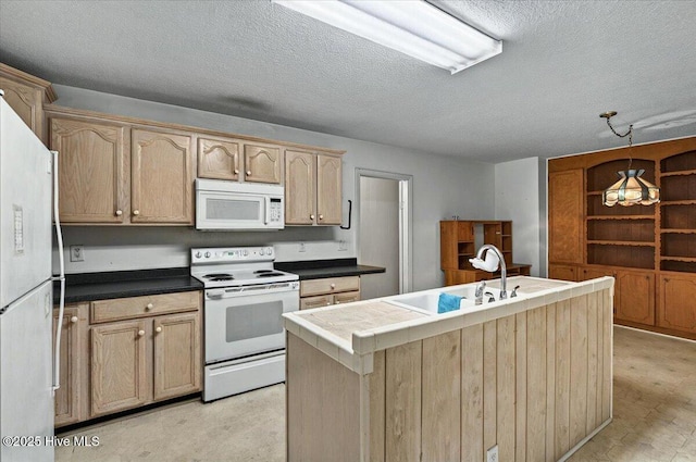 5685 Watts Rd SW, Ocean Isle Beach, NC 28469 - kitchen featuring white appliances, a sink, a textured ceiling, light brown cabinetry, and a center island with sink
