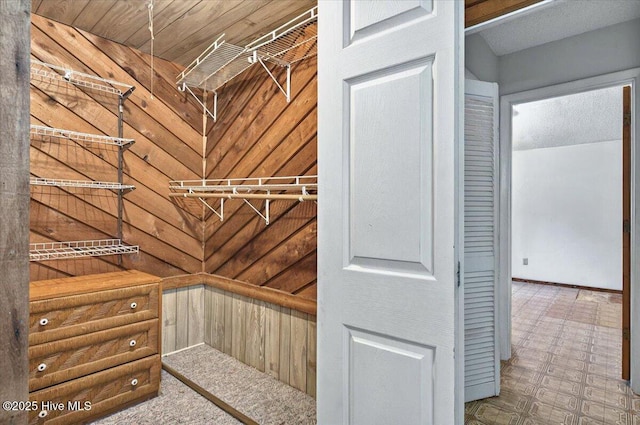 5685 Watts Rd SW, Ocean Isle Beach, NC 28469 - spacious closet featuring tile patterned floors