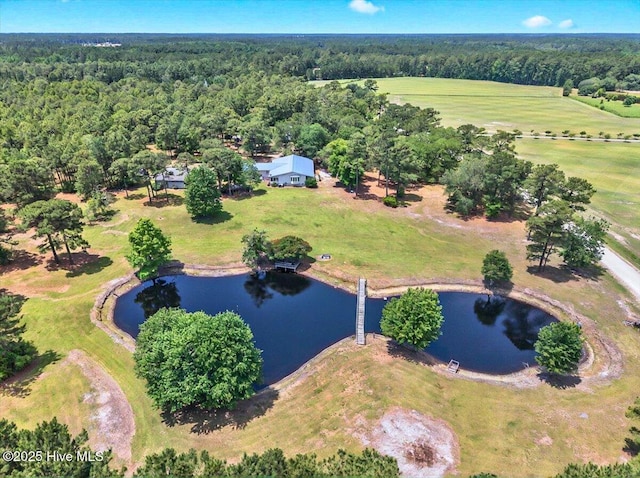 5685 Watts Rd SW, Ocean Isle Beach, NC 28469 - view of property location with a large body of water and a heavily wooded area