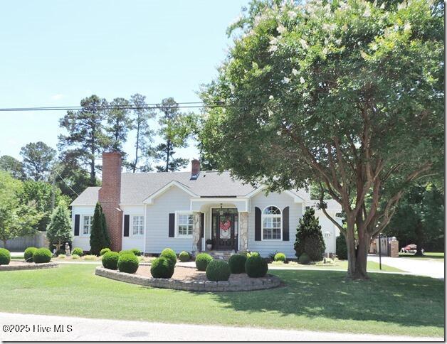 110 E Blalock Rd, Lucama, NC 27851 - ranch-style home with a front lawn
